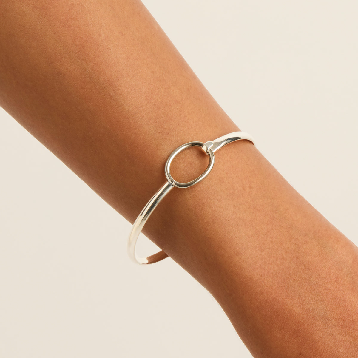 Silver oval ring tension Bangle