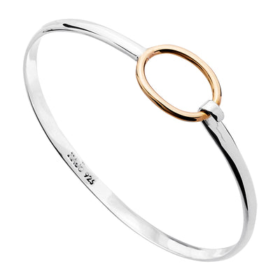 Gold plated oval ring tension bangle