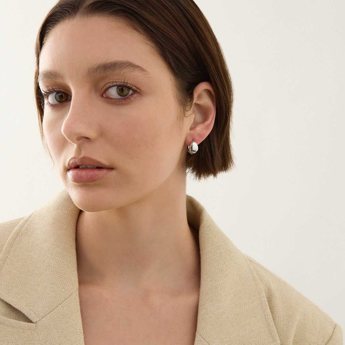 La Muse Silver Huggie Earrings
