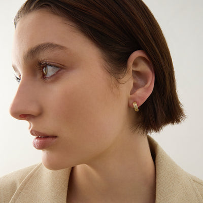 Carrousel Yellow Gold plated Huggie Earring