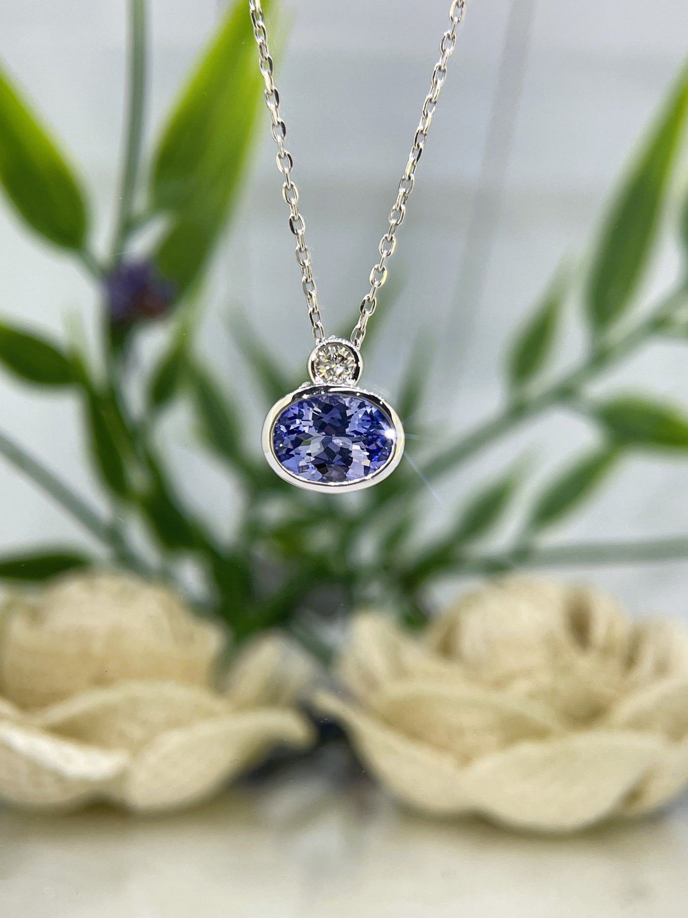 9ct White gold Tanzanite & Diamond pendant